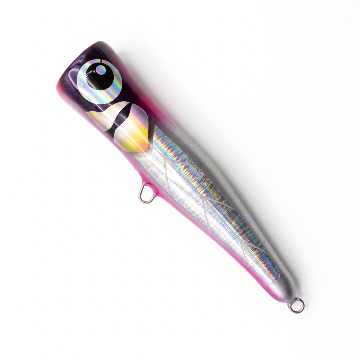 A hard bait fishing lure with a holographic silver body, a pink and purple gradient back, and a realistic black and white eye on the head, shown on a plain white background.