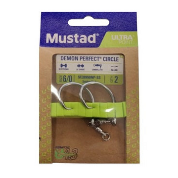 Mustad Demon Perfect Circle fishing hook in its original packaging on the left, and a single silver-colored hook displayed on the right against a white background.